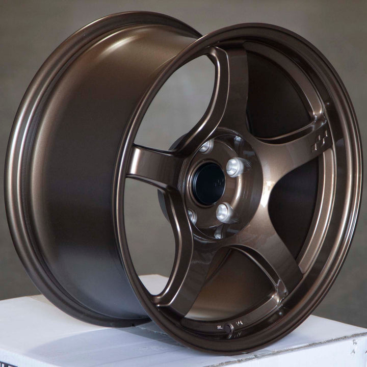 Circuit CSF5 Bronze alloy wheel rim shown at an angle, 5-spoke with dark accents