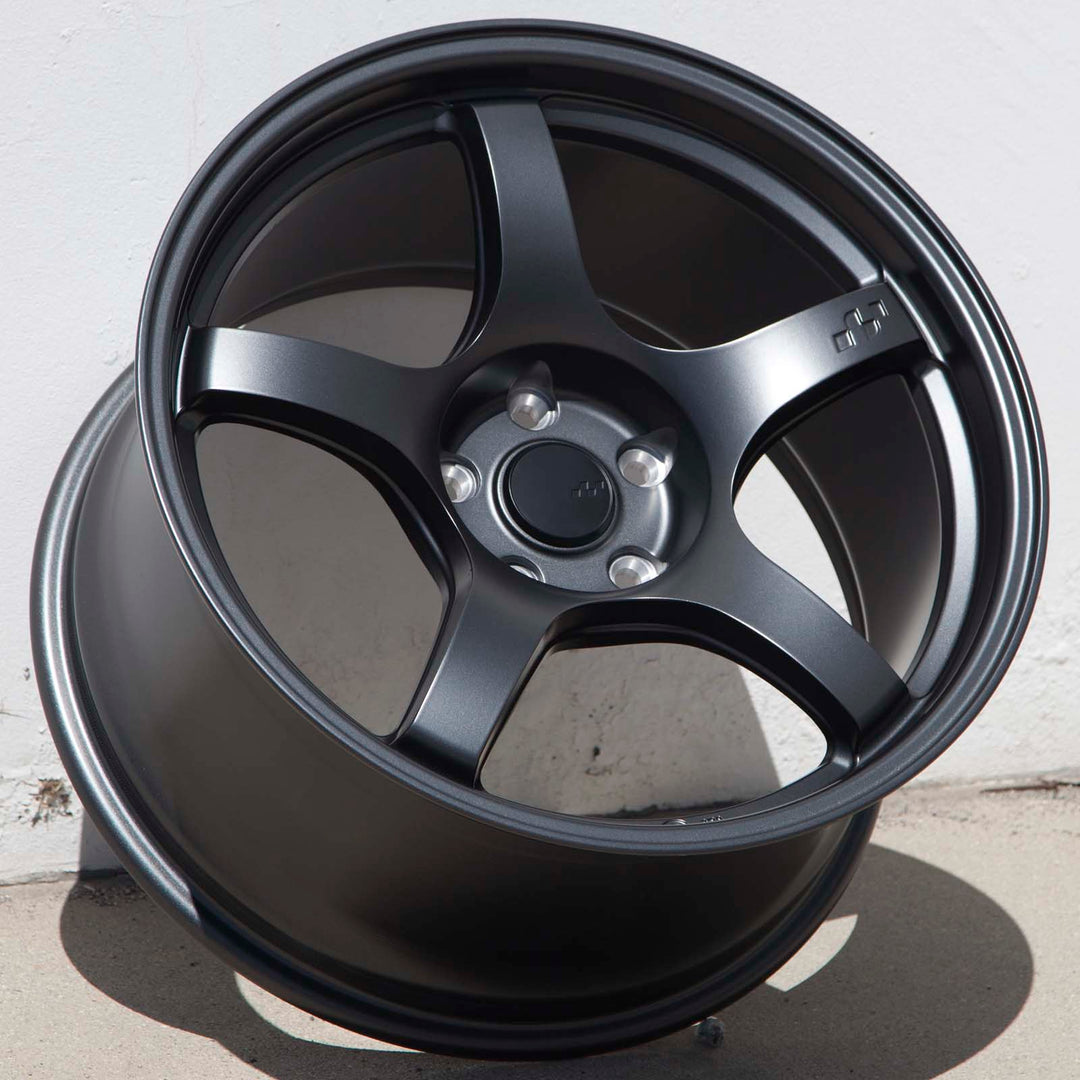 Matte gunmetal 5-spoke alloy Circuit CSF5 wheel with round center cap, front view