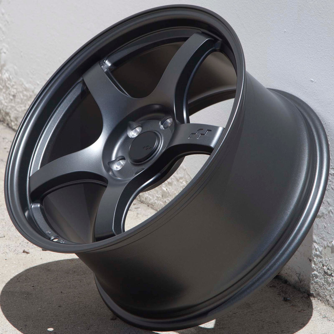 Matte gunmetal alloy Circuit CSF5 wheel three-quarter view, smooth rim and 5-spoke center hub