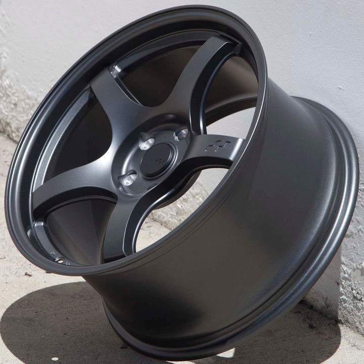 Matte gunmetal alloy Circuit CSF5 wheel three-quarter view, smooth rim and 5-spoke center hub
