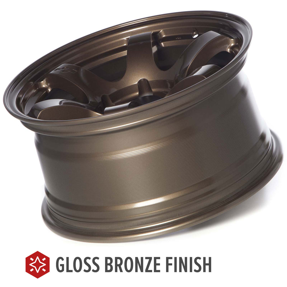 Circuit Steller Gloss bronze alloy wheel with multi-spoke design and center cap, angled view